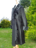 Coat Fastens with a Hook and Loop