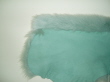 Magnet is in top corner in sheepskin